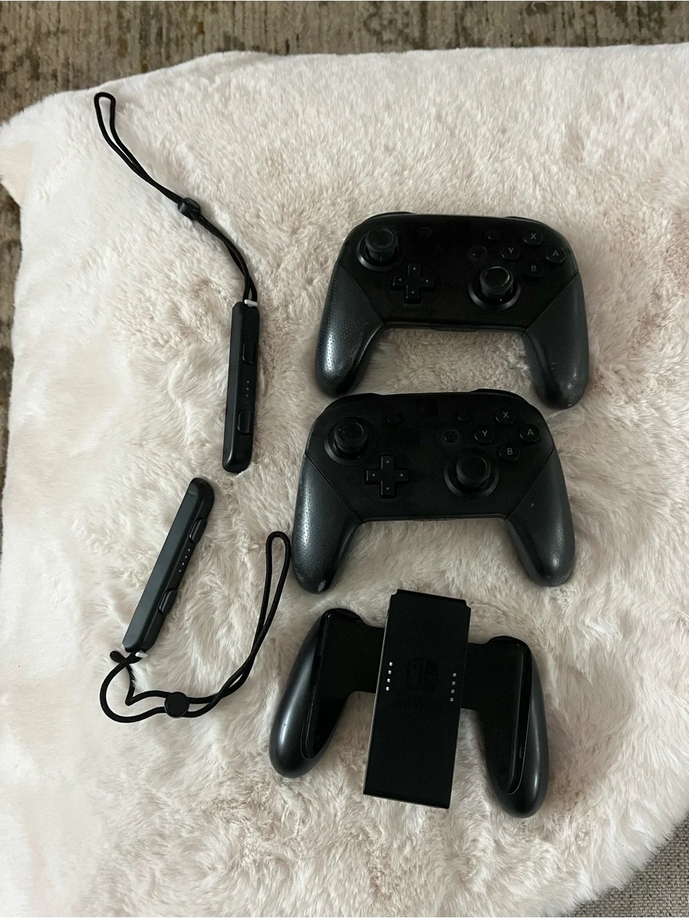Nintendo Black Wireless Controllers with Grip & Wrist Straps